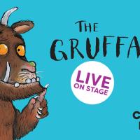The Gruffalo points to the sign with his name on it